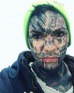 Male-Tribal-Face-Tattoo-n_e.r_o_.jpg